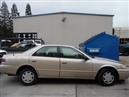 1997 TOYOTA CAMRY TAN CE 2.2L MT Z17947